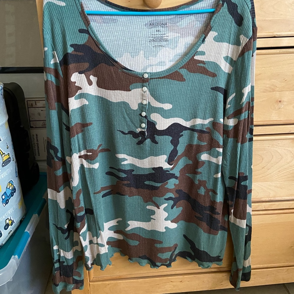 Arizona, long sleeve button up camo shirt with ruffled bottom and end of sleeves